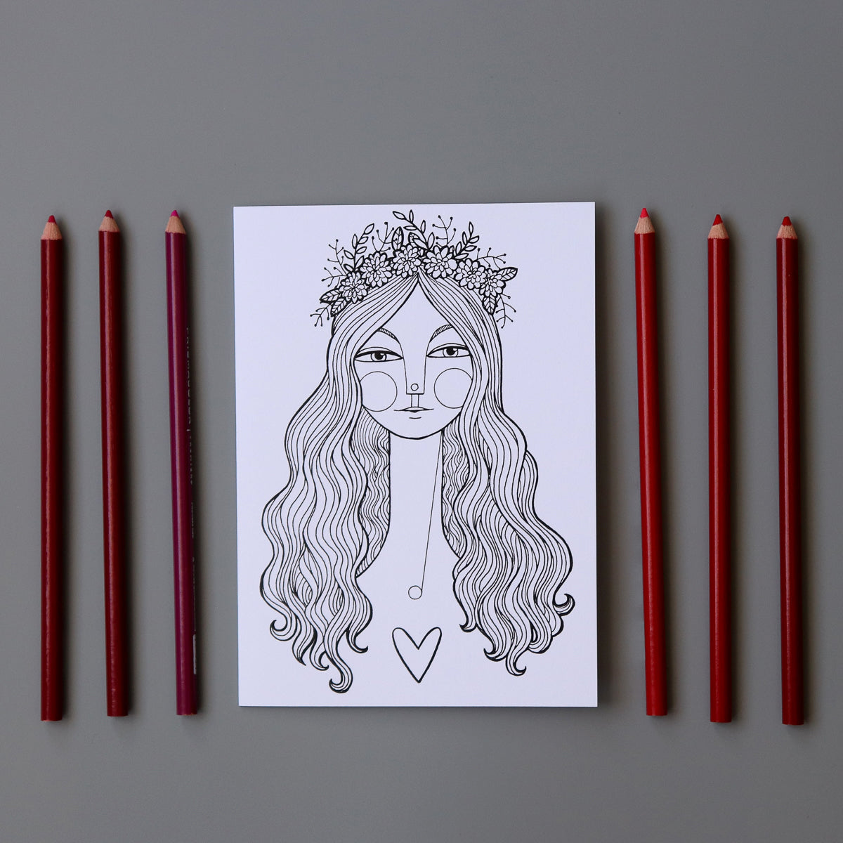 Halo Girl coloring cards with red and pink colored pencils. These cards can be colored on or left black and white.