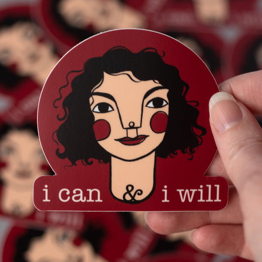 Vinyl sticker with the image of a girl with curly dark hair and the words "I can and I will" on the bottom.