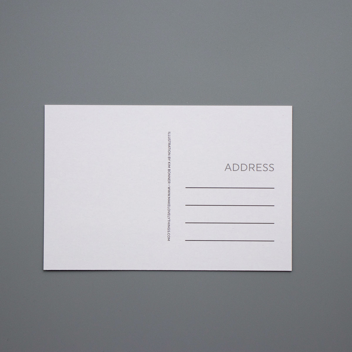 The back of the Identity postcards feature space for writing a message and space to add the address of the person you are mailing the postcard to.