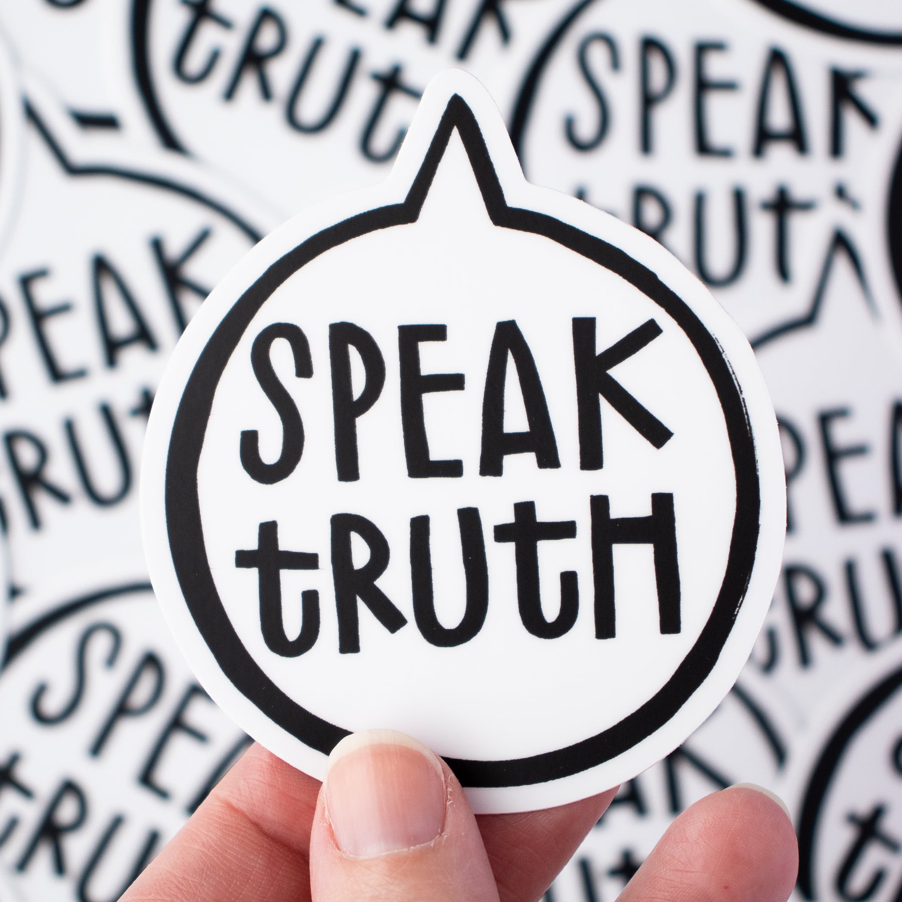 Vinyl sticker of a speech bubble with the words, "Speak Truth" inside. Illustration by Kim Bonner of Make Lovely Things.